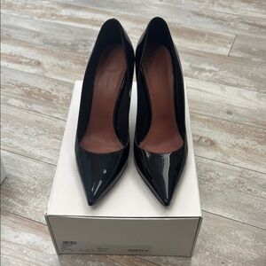 Amina muaddi black patent leather
